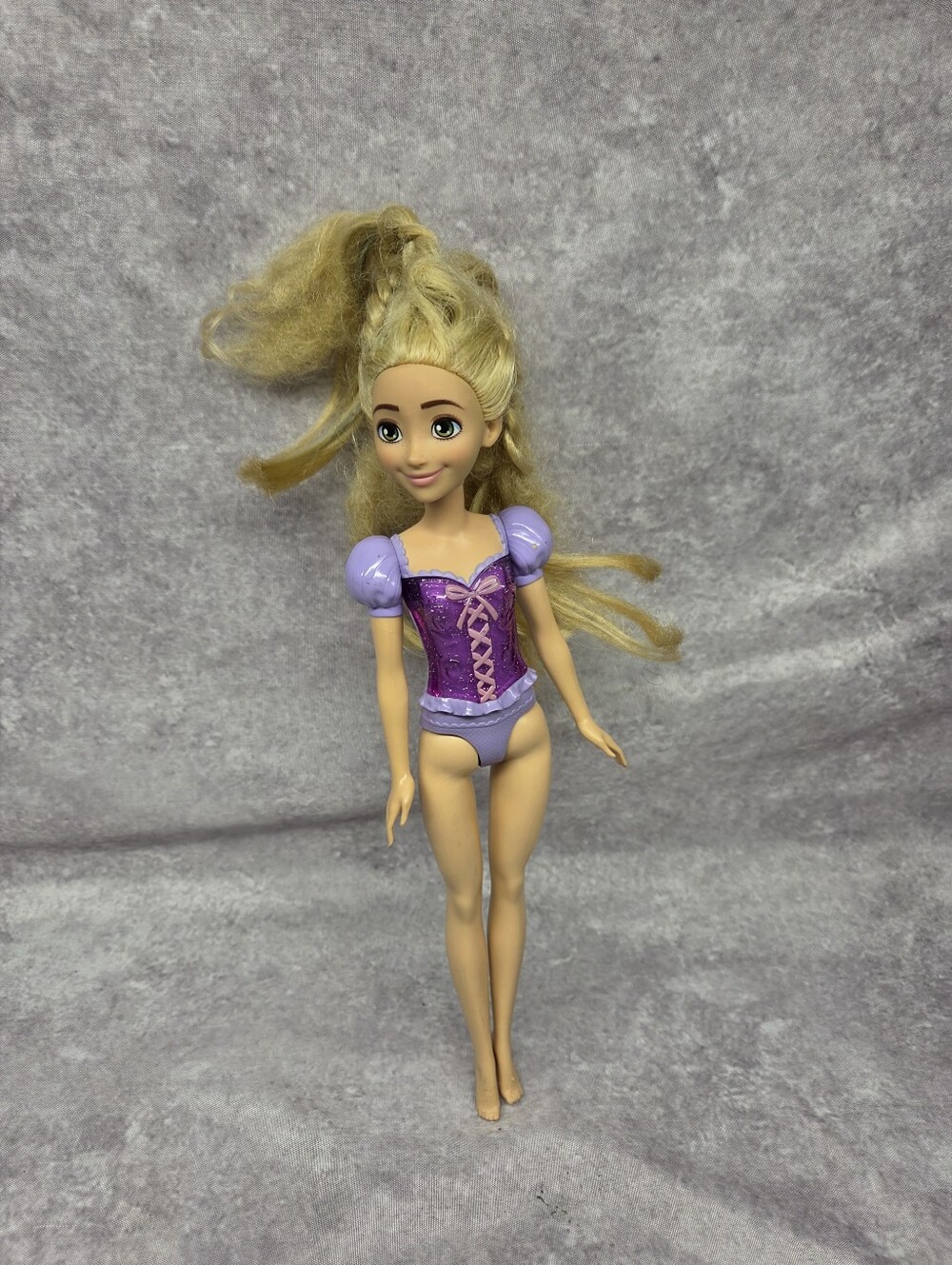 Disney Rapunzel Doll Wearing Purple Corset 2022,